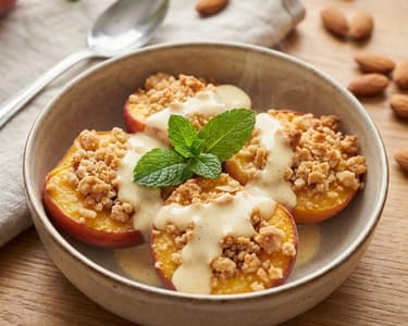 Baked Peaches with Almond Crumble and Vanilla Sauce
