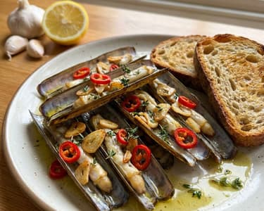 Razor clams baked with garlic and chili