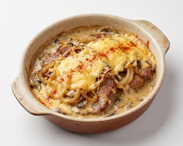 Baked pork collar with cheese and cream