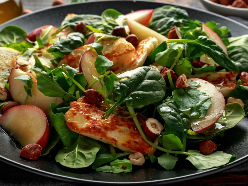 Green salad with grilled Halloumi cheese and peaches