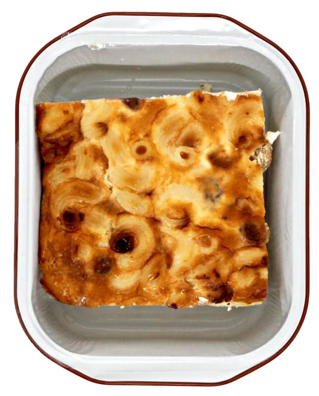Sweet macaroni pudding with cheese and raisins