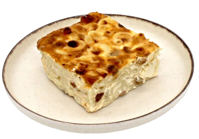 Sweet macaroni pudding with cheese and raisins