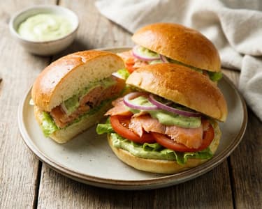 Buns with yogurt and smoked trout with avocado dressing