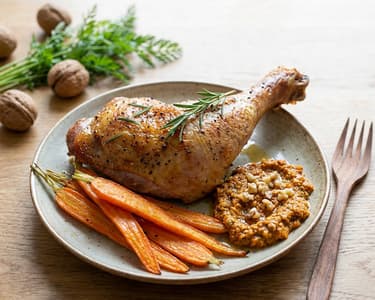 Baked Turkey Thighs with Carrots and Carrot Top Pesto