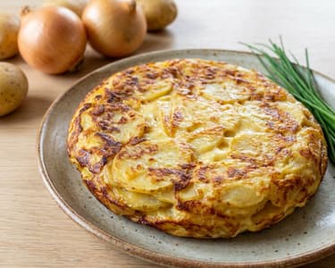 Tortilla de cartofi spaniolă cu brânză Edam
